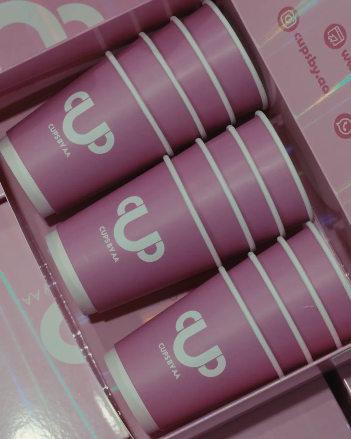 Finished cups counted into a box